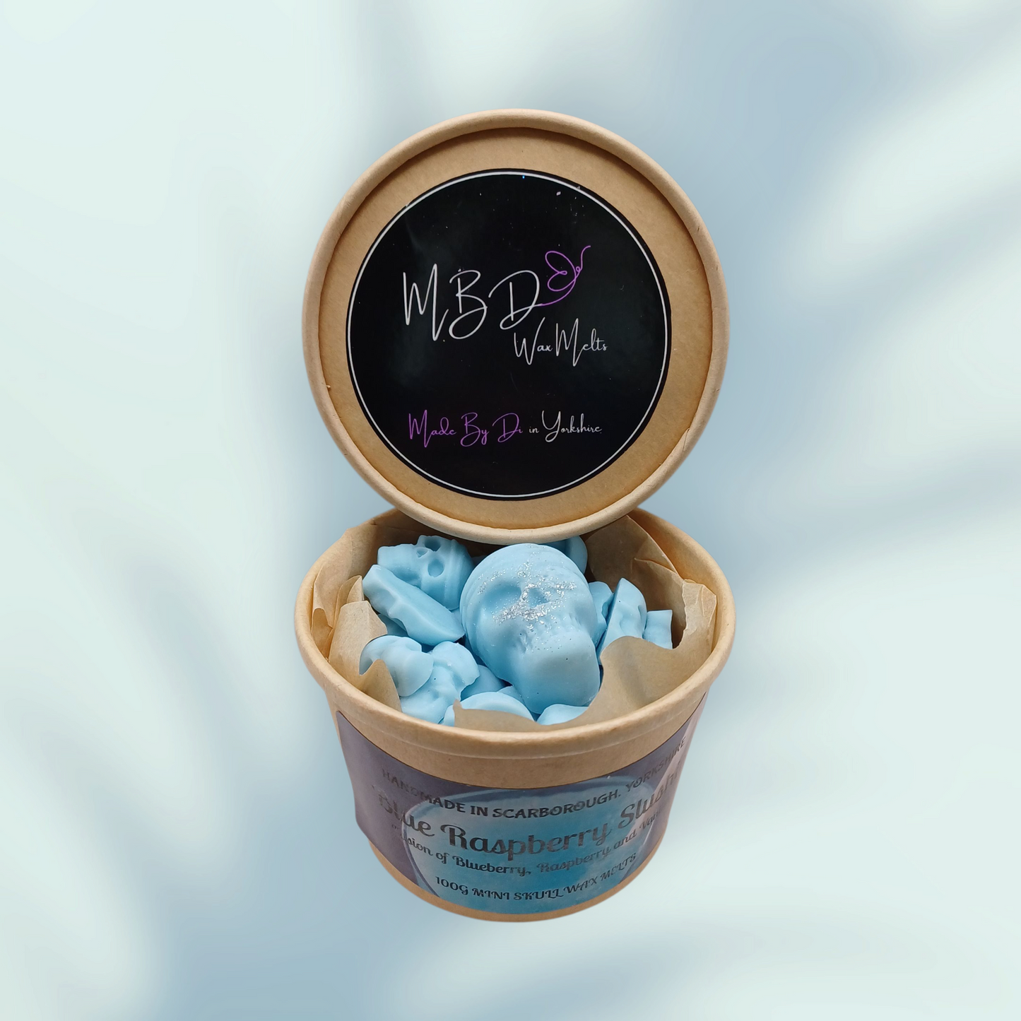 Open container of MBD fragrance mini wax melts