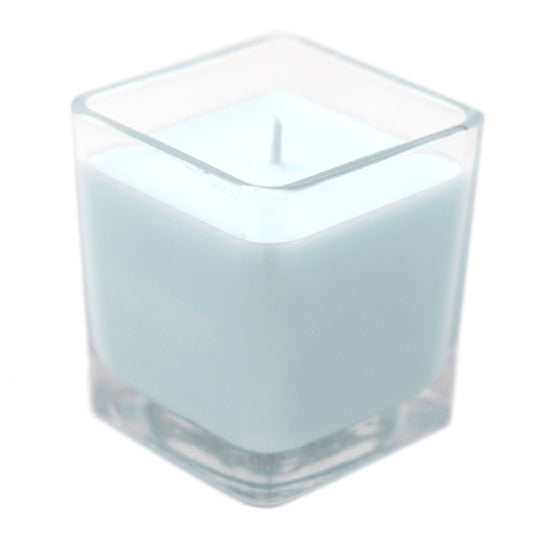 Clear glass square candle holder on a white background