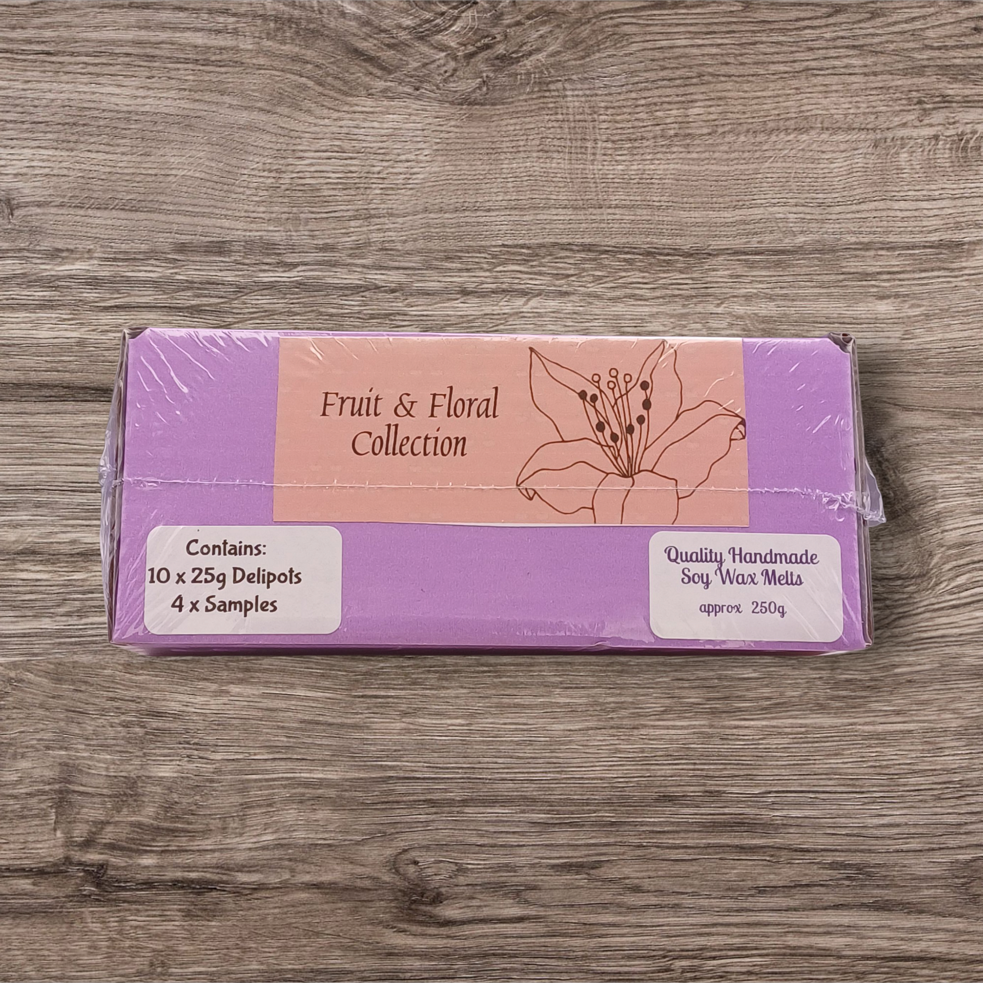 Packaged product from the Fruit & Floral Collection on a wooden surface