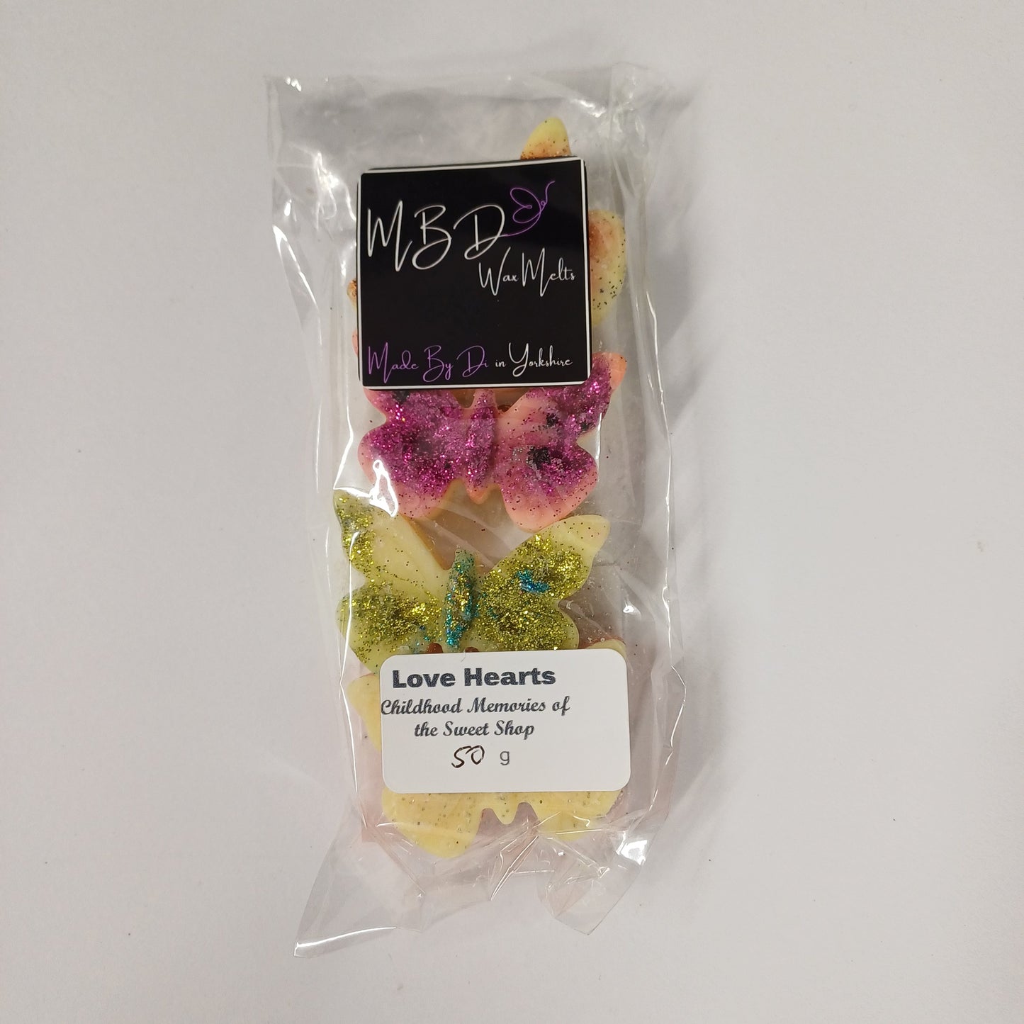 Packaged decorative Butterfly Wax Melts on a white background.