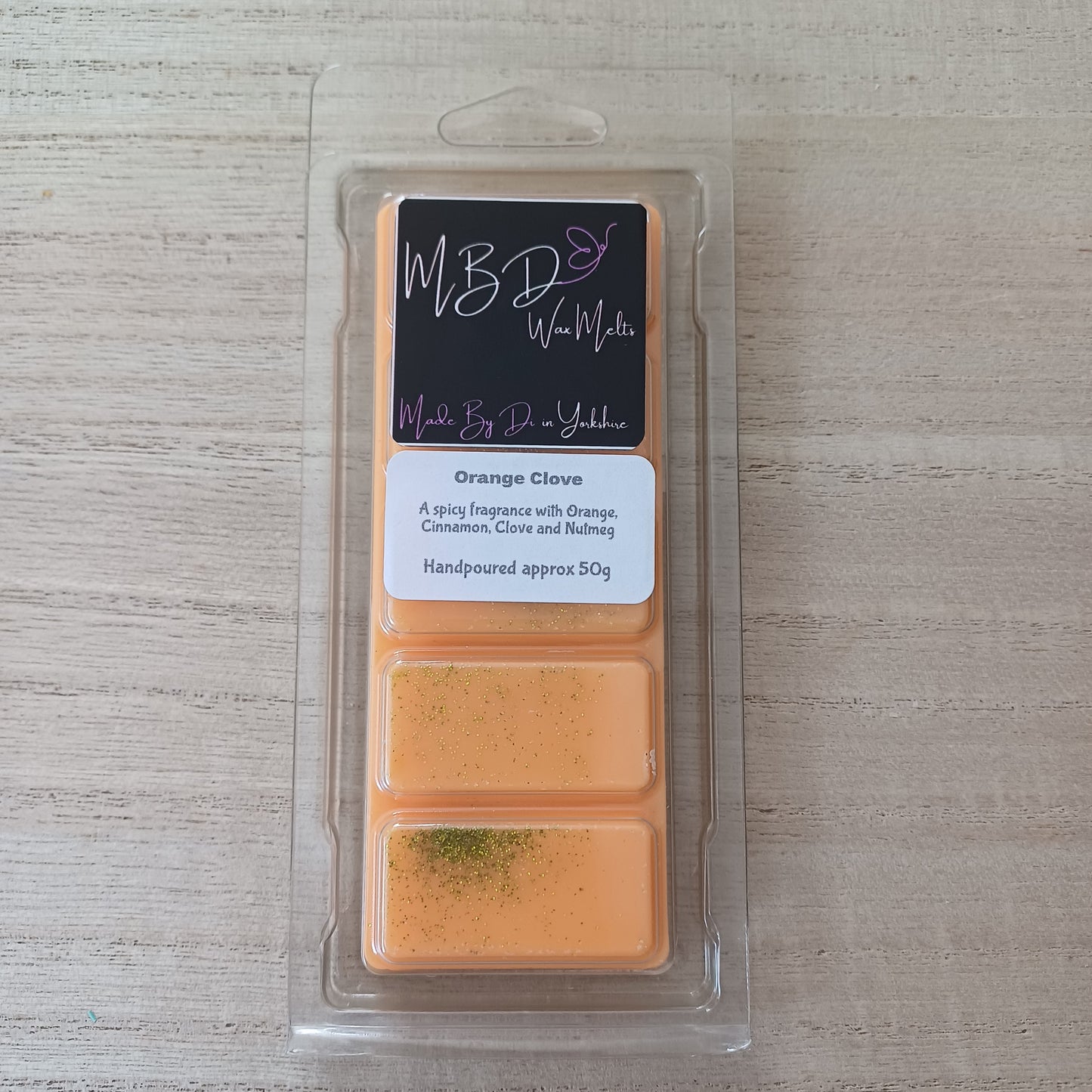 Packaged Wax Melt on a wooden background