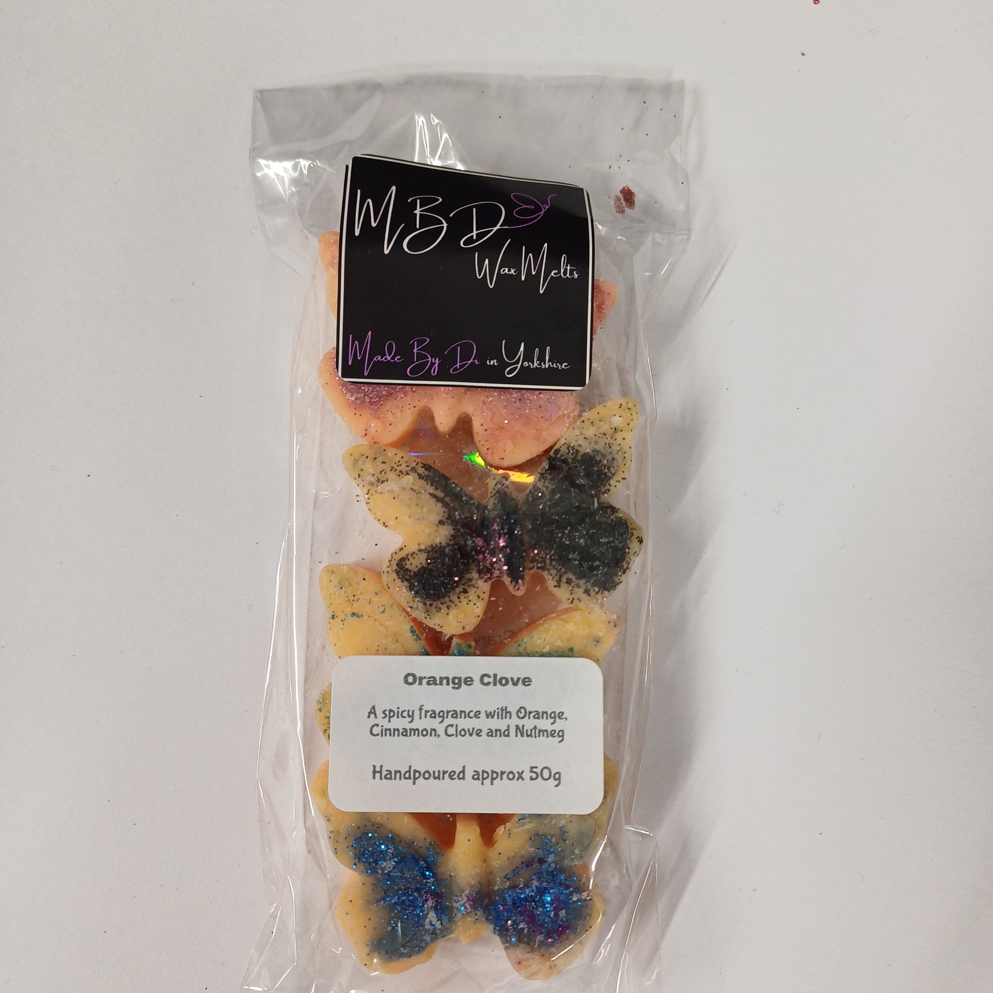 Packaged Decorative Wax Melts on a white surface